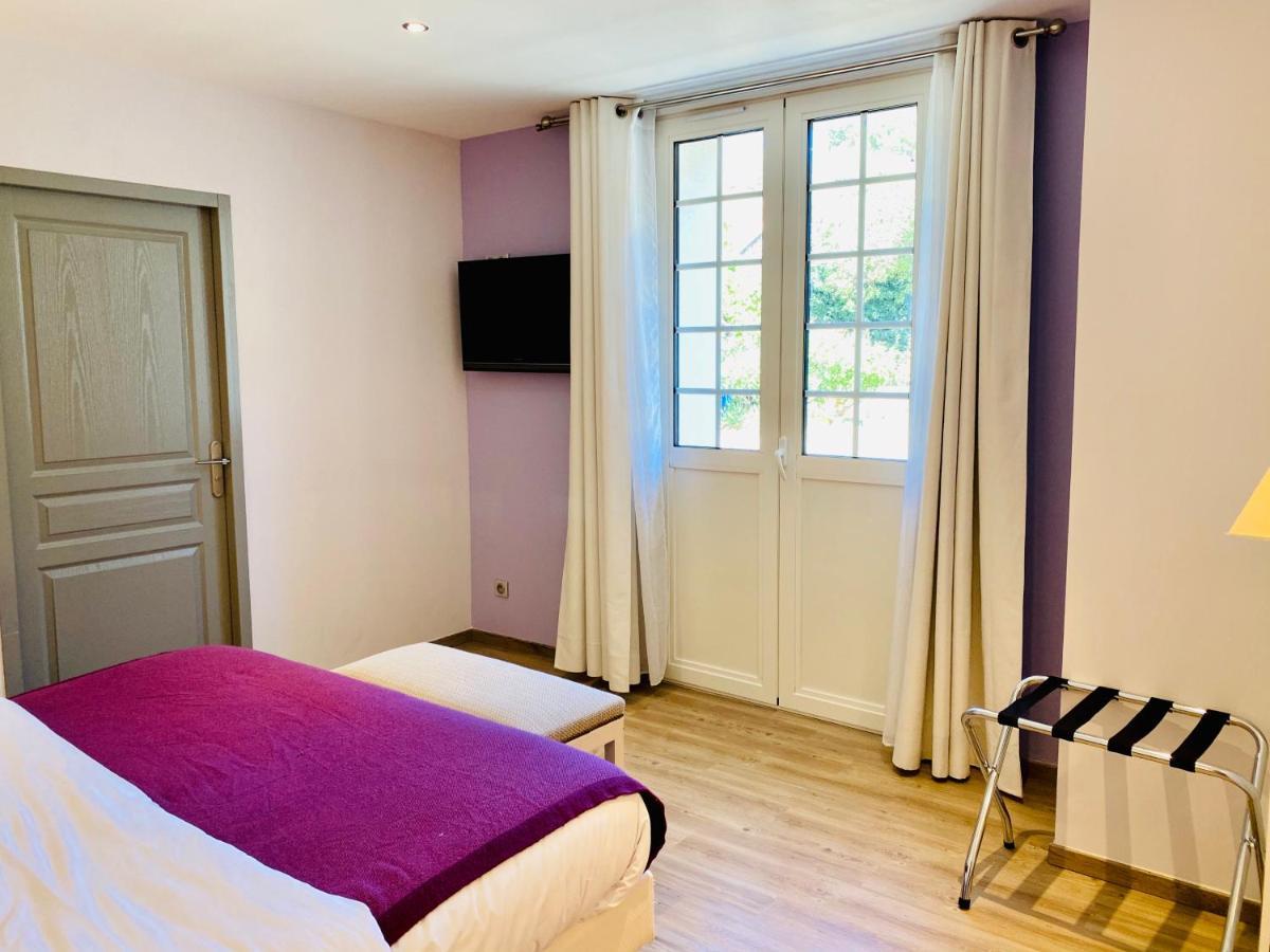 Hotel Logis Du Champ De Mars Puy-Saint-Martin Esterno foto