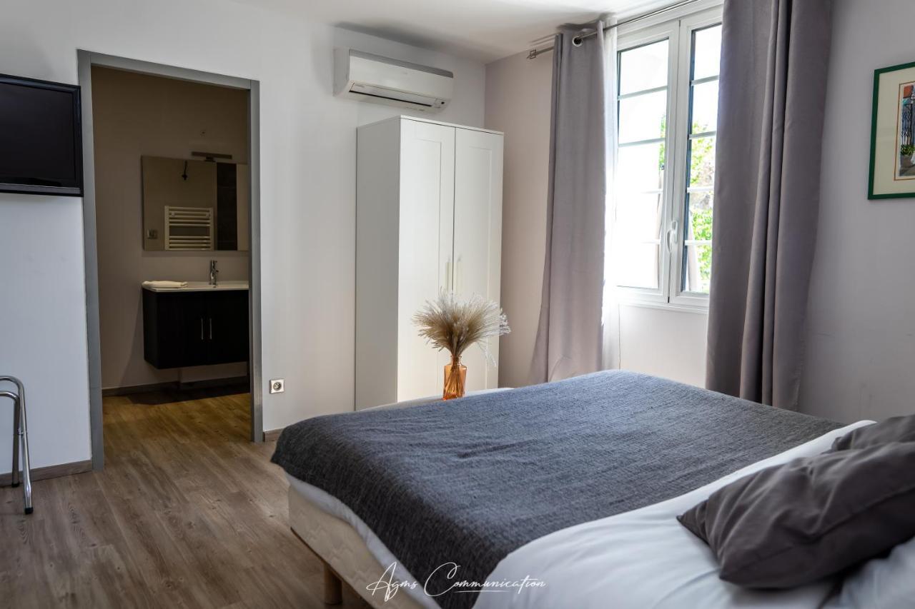 Hotel Logis Du Champ De Mars Puy-Saint-Martin Esterno foto