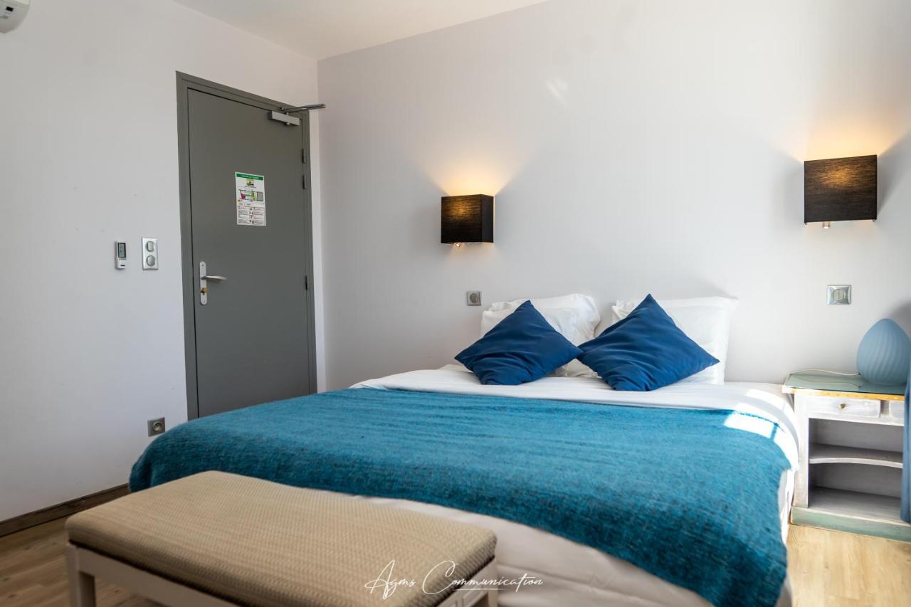 Hotel Logis Du Champ De Mars Puy-Saint-Martin Esterno foto